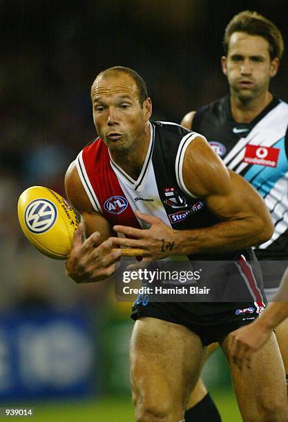 Stewart Loewe for St Kilda drops a mark with Darryl Wakelin for Port Adelaide in pursuit, during the Round 3 AFL Match between the St Kilda Saints...