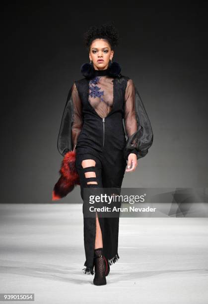 Model walks the runway wearing Alicia Perrillo at 2018 Vancouver Fashion Week - Day 6 on March 24, 2018 in Vancouver, Canada.