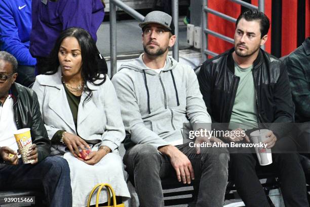 Aaron Rodgers attends a basketball game between the Los Angeles Clippers and the Milwaukee Bucks at Staples Center on March 27, 2018 in Los Angeles,...
