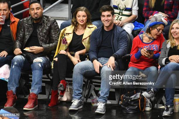 Model Alyssa Arce and a guest attend a basketball game between the Los Angeles Clippers and the Milwaukee Bucks at Staples Center on March 27, 2018...