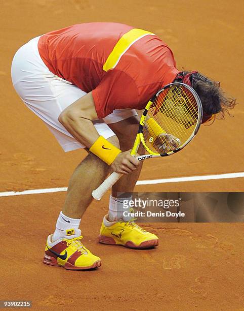 Rafael Nadal of Spain celebrates after beating Tomas Berdych of Czech Republic 7-5, 6-0, 6-2 during the first match of the Davis Cup final at the...