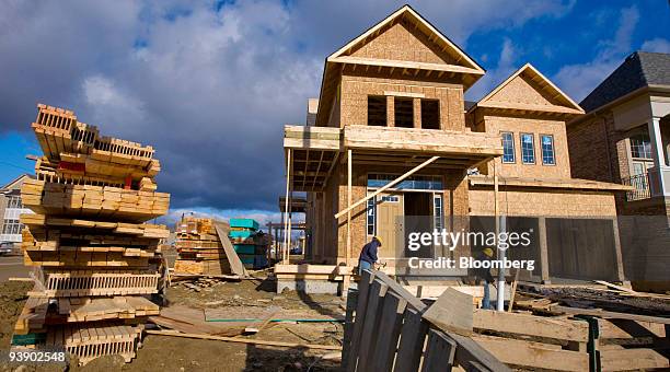 Construction continues on a new home in the Arista Homes and Fieldgate Homes Vaughan Valley subdivision outside Toronto in Vaughan, Ontario, Canada,...