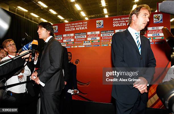 German coach Joachim Loew stands near Australian coach Pim Verbeek after the Final Draw for the FIFA World Cup 2010 December 4, 2009 at the...