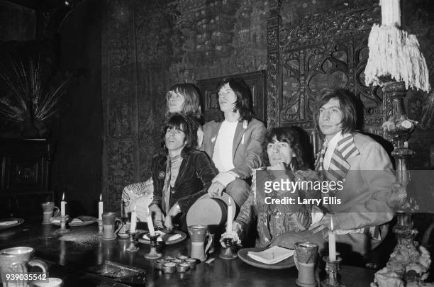 The Rolling Stones at the Kensington Gore Hotel, where they staged a mock-medieval banquet for the launch of their new album 'Beggars Banquet',...