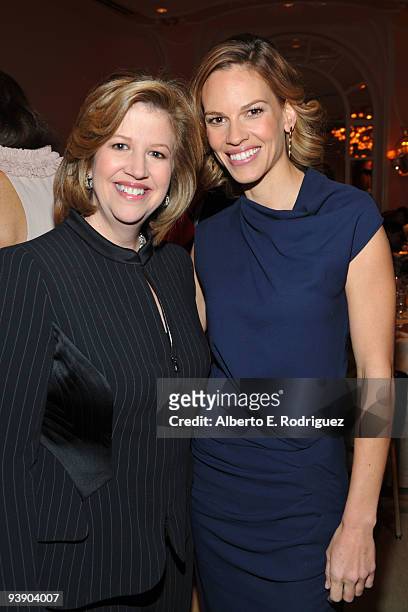 President & CEO, A&E Television Networks Abbe Raven and actress Hilary Swank attend the Hollywood Reporter's Annual Women in Entertainment Breakfast...