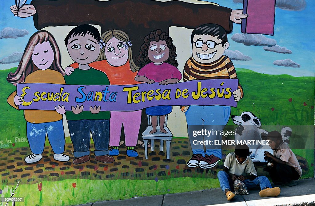 TO GO WITH AFP STORY - Two children play