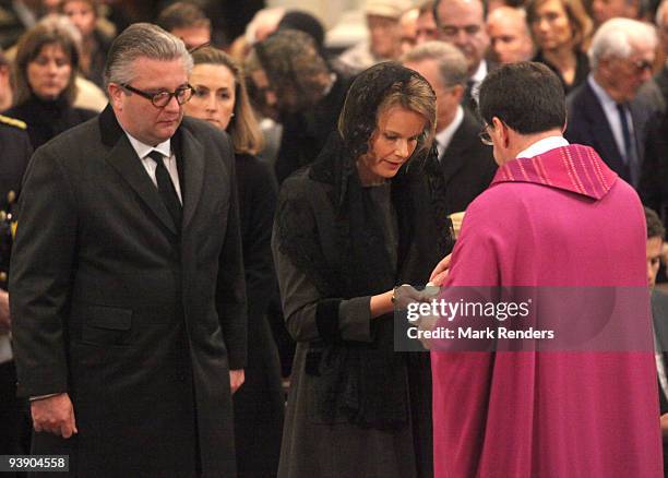 Prince Laurent and Princess Mathilde of Belgium attend the funeral of Prince Alexandre of Belgium at Eglise Notre-Dame de Laeken on December 4, 2009...