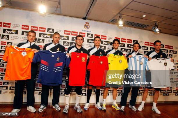 Real Madrid players Rafael Van der Vaart, Karim Benzema, Cristiano Ronaldo, Iker Casillas, Kaka, Gonzalo Higuain and Christoph Metzelder poses after...