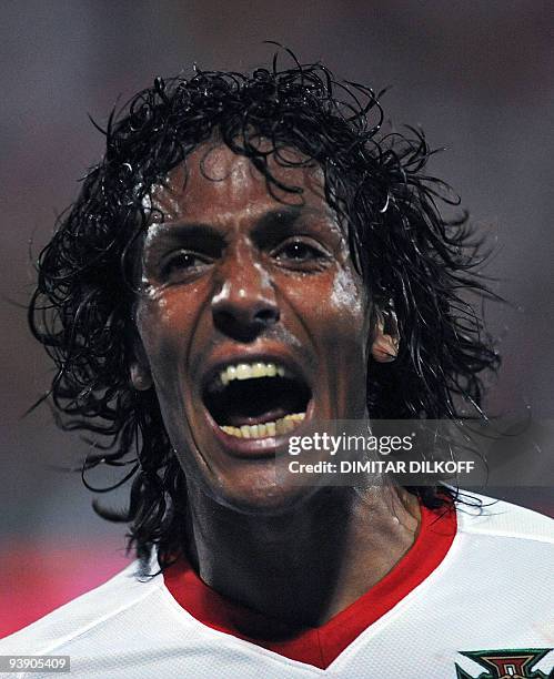 Portugal's Bruno Alves celebrates his goal against Albania during their 2010 World Cup qualifying football match at the Qemal Stafa stadium on June...