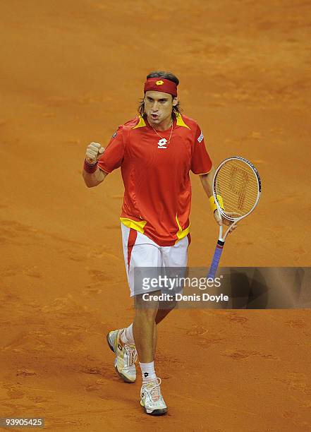 David Ferrer of Spain celebrates after winning a point against Radek Stepanek of Czech Republic during the second match of the Davis Cup final at the...