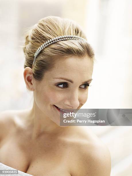 Reality TV star Jennifer Schefft poses at a portrait session for Us Weekly in a wedding dress. PUBLISHED IMAGE.