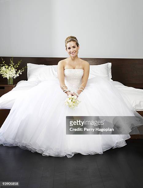 Reality TV star Jennifer Schefft poses at a portrait session for Us Weekly in a wedding dress. PUBLISHED IMAGE.