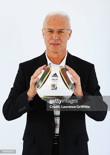 Franz Beckenbauer presents the official match ball for the FIFA World Cup 2010 on December 4, 2009 in Cape Town, South Africa.