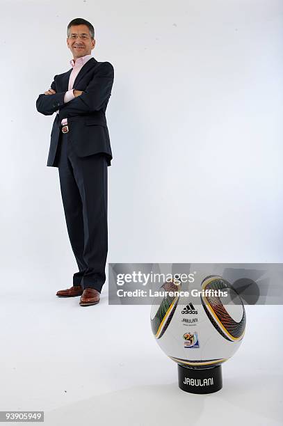 Adidas Chief Executive Herbert Hainer presents the official match ball for the FIFA World Cup 2010 on December 4, 2009 in Cape Town, South Africa.