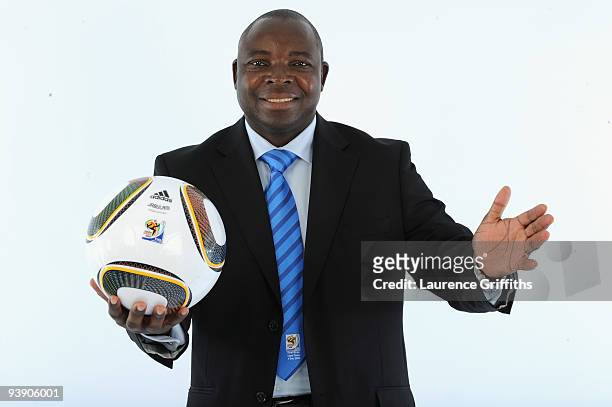 President of SAFA Kirsten Nematandani presents the official match ball for the FIFA World Cup 2010 on December 4, 2009 in Cape Town, South Africa.