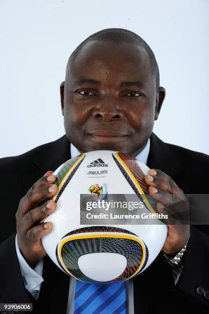 President of SAFA Kirsten Nematandani presents the official match ball for the FIFA World Cup 2010 on December 4, 2009 in Cape Town, South Africa.