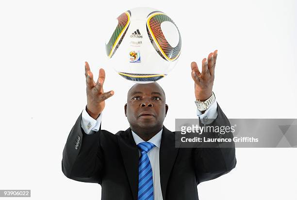 President of SAFA Kirsten Nematandani presents the official match ball for the FIFA World Cup 2010 on December 4, 2009 in Cape Town, South Africa.