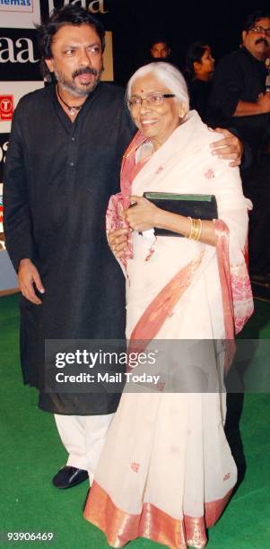 Director Sanjay Leela Bhansali with his mother at the premiere of the film �Paa� in Mumbai on Thursday, December 3, 2009.