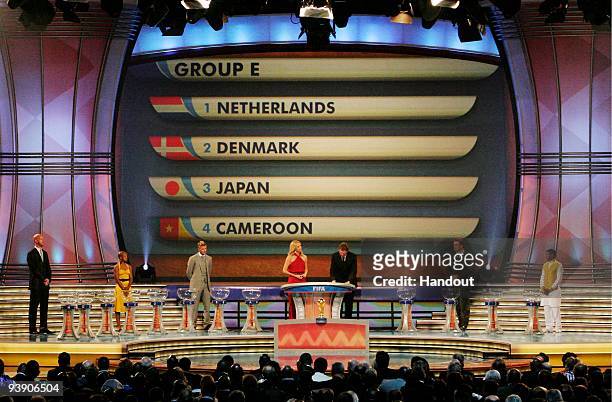 In this handout photo provided by the 2010 FIFA World Cup Organising Committee, Group E, showing Netherlands, Denmark, Japan and Cameroon, during the...
