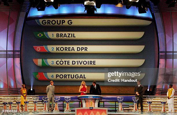 In this handout photo provided by the 2010 FIFA World Cup Organising Committee, Group G, showing Brazil, North Korea, Ivory Coast and Portugal during...