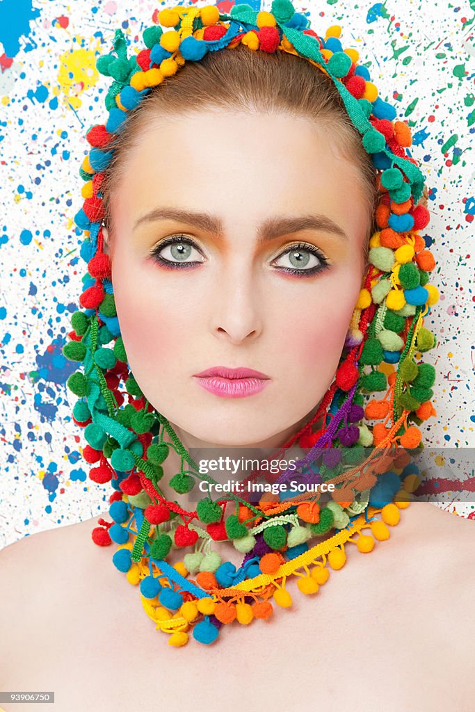 Young woman wearing colourful headdress