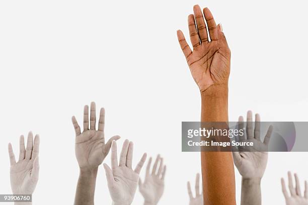 mani sollevate - braccio umano foto e immagini stock