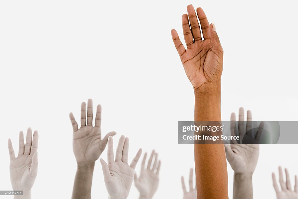 Hands Raised High-Res Stock Photo - Getty Images