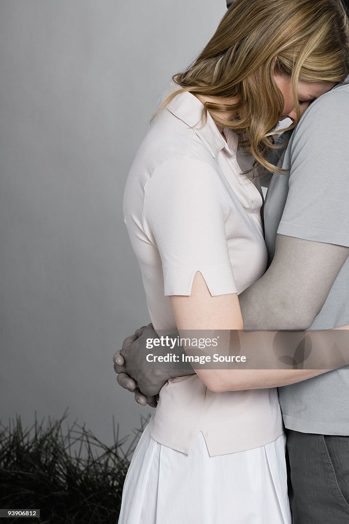 Woman being consoled