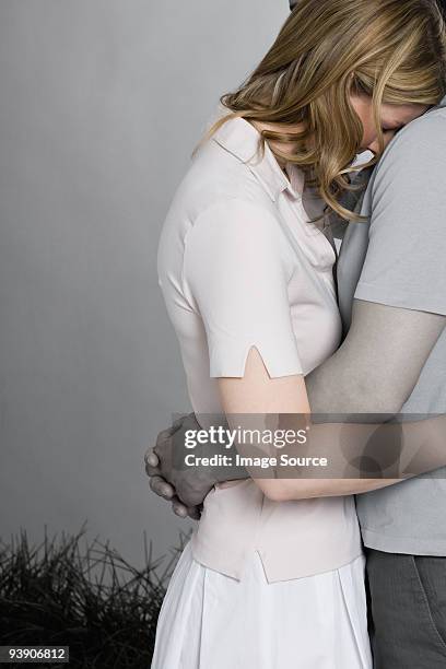 woman being consoled - man cry touching stock pictures, royalty-free photos & images