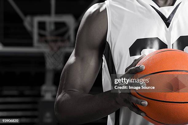 basketball player with basketball - basketball player stock pictures, royalty-free photos & images