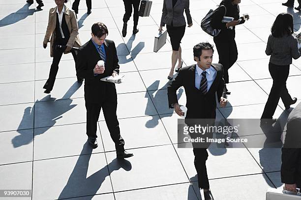 businesspeople walking - large group of people running stock pictures, royalty-free photos & images
