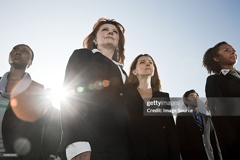 Businesspeople looking up