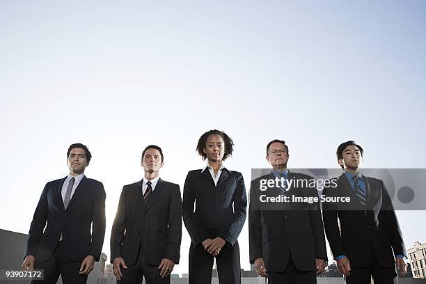 businesswoman and businessmen - challenge authority stock pictures, royalty-free photos & images