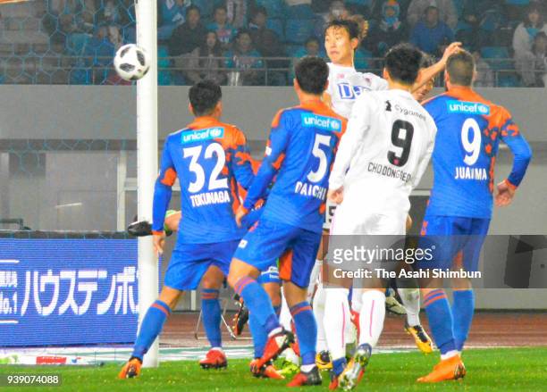 Jung Seung Hyun of Sagan Tosu heads the ball to score his side's second goal during the J.League J1 match between V-Varen Nagasaki and Sagan Tosu at...