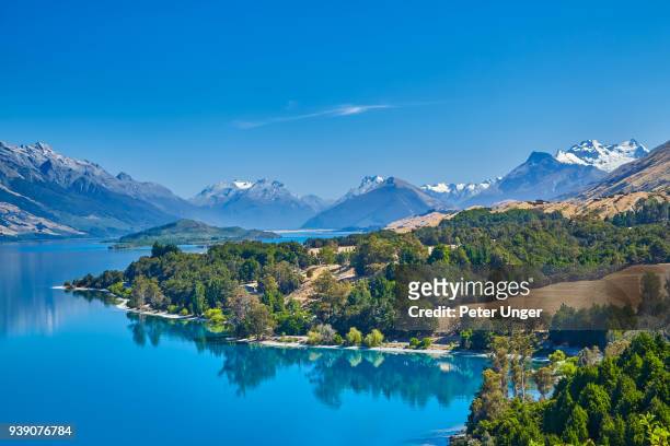 famous view of lake wakatipu, queenstown, otago, new zealand - lake wakatipu stock pictures, royalty-free photos & images