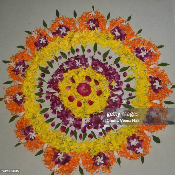 floral carpet/pookkalam/onam festival-kerala - onam foto e immagini stock