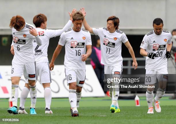 Naoki Ishihara of Vegalta Sendai celebrates scoring the opening goal with his team mates during the J.League J1 match between FC Tokyo and Vegalta...