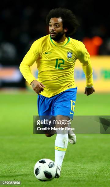 Marcelo of Brazil runs with the ball during the international friendly match between Germany and Brazil at Olympiastadion on March 27, 2018 in...