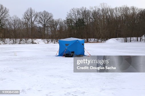 Ice fishing Shelter on the frozen pond