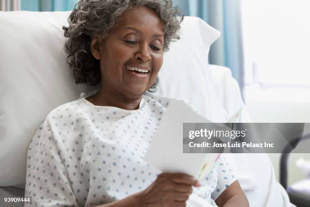 Patient Reading Reference 115 Hospital Patient Reading Card Stock Photos, High-Res Pictures, and ...