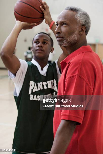 139 Arm Of Black Basketball Player Shooting Ball Stock Photos, High-Res