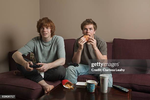 boys playing video games - putney london stock pictures, royalty-free photos & images