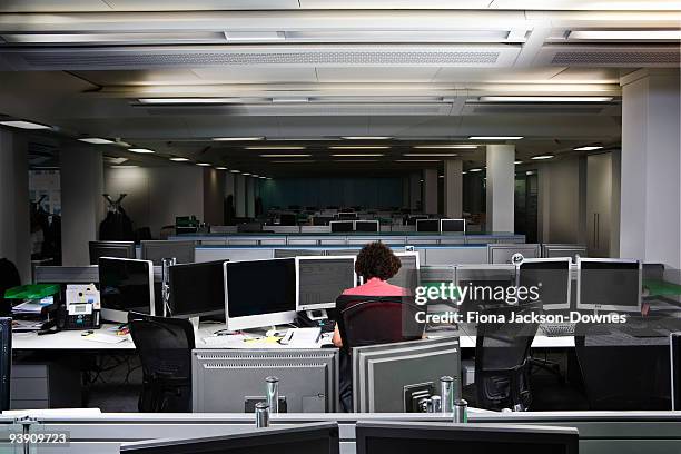 a business woman working late - office cubicle stock pictures, royalty-free photos & images