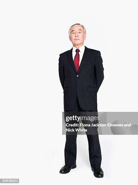 a full length portrait of an asian man - man full length stock pictures, royalty-free photos & images