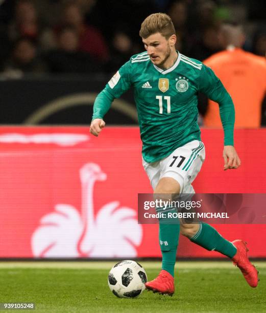 Germany's forward Timo Werner plays the ball during the international friendly football match between Germany and Brazil in Berlin, on March 27,...