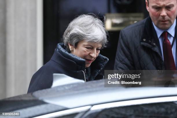 Theresa May, U.K. Prime minister, departs number 10 Downing Street to attend a weekly questions and answers session in Parliament in London, U.K., on...