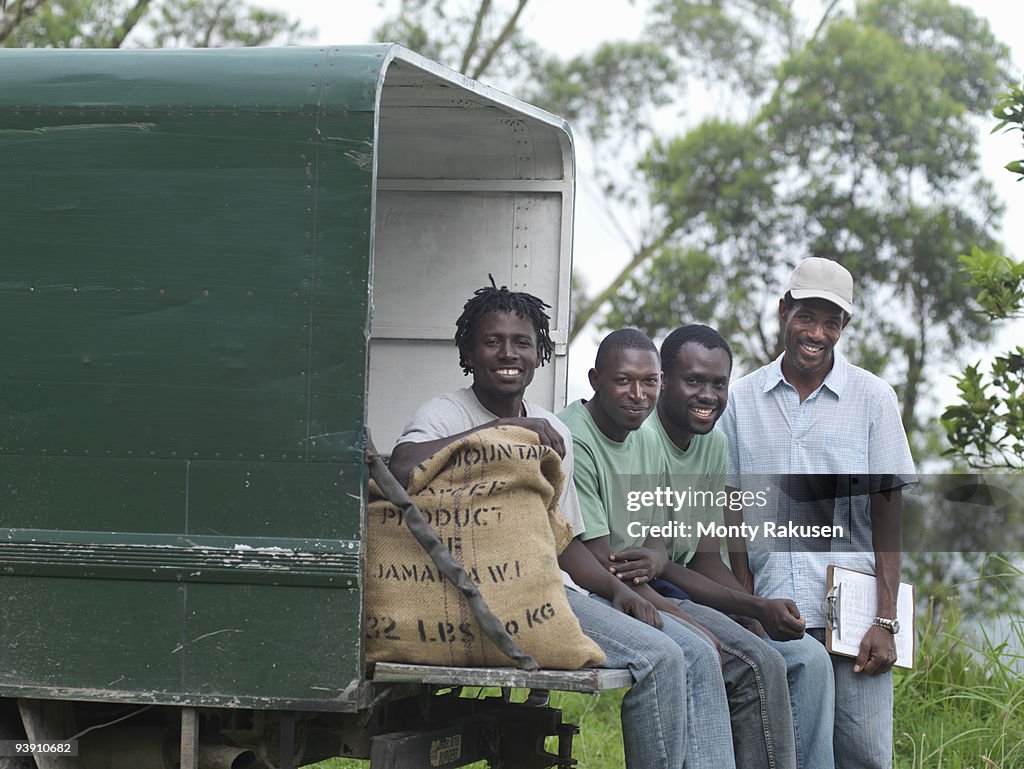 Coffee Workers Sitting On Truck