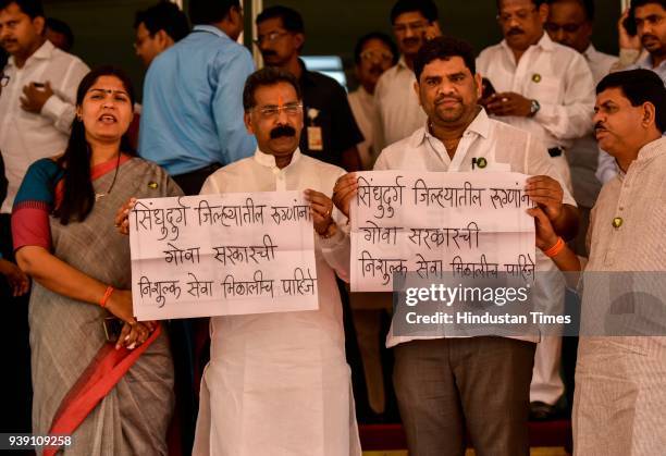 Shiv Sena MLAs protest for various demands during the Maharashtra State Assembly Session at Vidhan Bhavan, on March 27, 2018 in Mumbai, India.