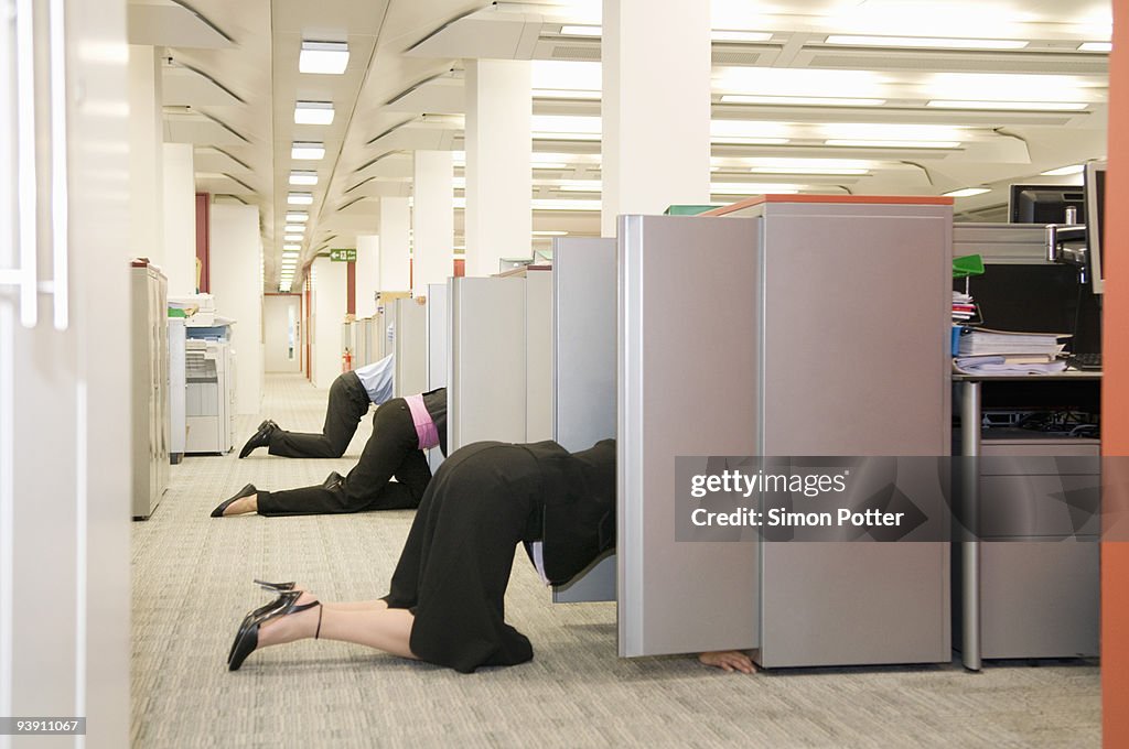 Business folk searching store cupboards