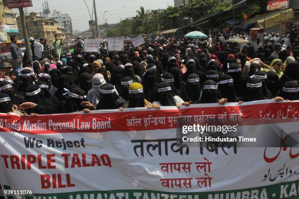 Thousands of Muslim women gathered to protest against the Triple Talaq Bill, proposed by the central government, at Mumbra, on March 26, 2018 in...